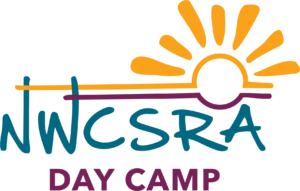 This logo is for the Day Camp. "NWCSRA" is in the middle in blue, with "Day Camp" right below it in purple. There is a sun just above the blue letters, with yellow on top and purple on the bottom. Instead of the colors touching to complete the sun, both colors diverge and stretch outward.